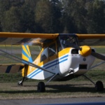 Tailwheel aircraft positioned on the runway used for tailwheel training and upset recovery training.